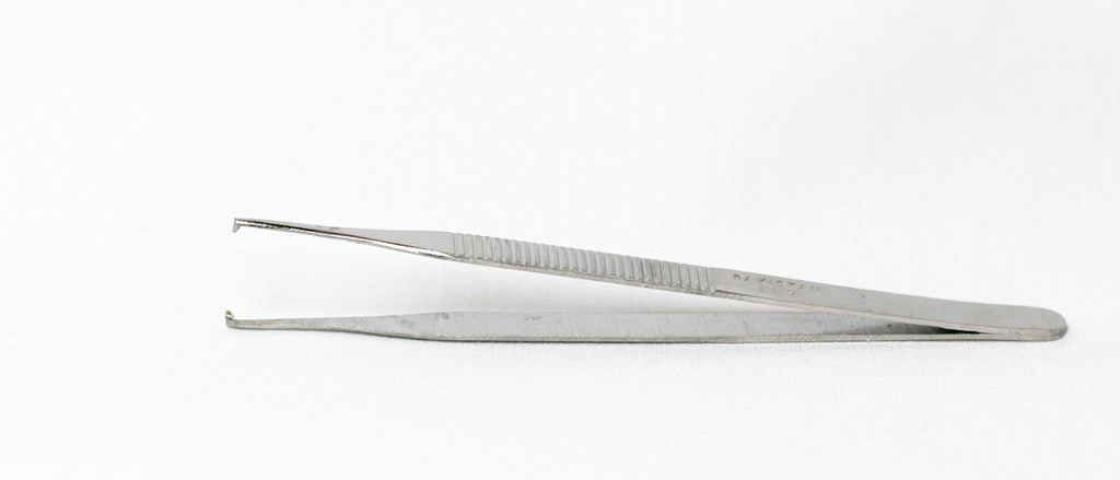 Adson's forceps, 1  in the suture kit and 2 are included in the staple kit.