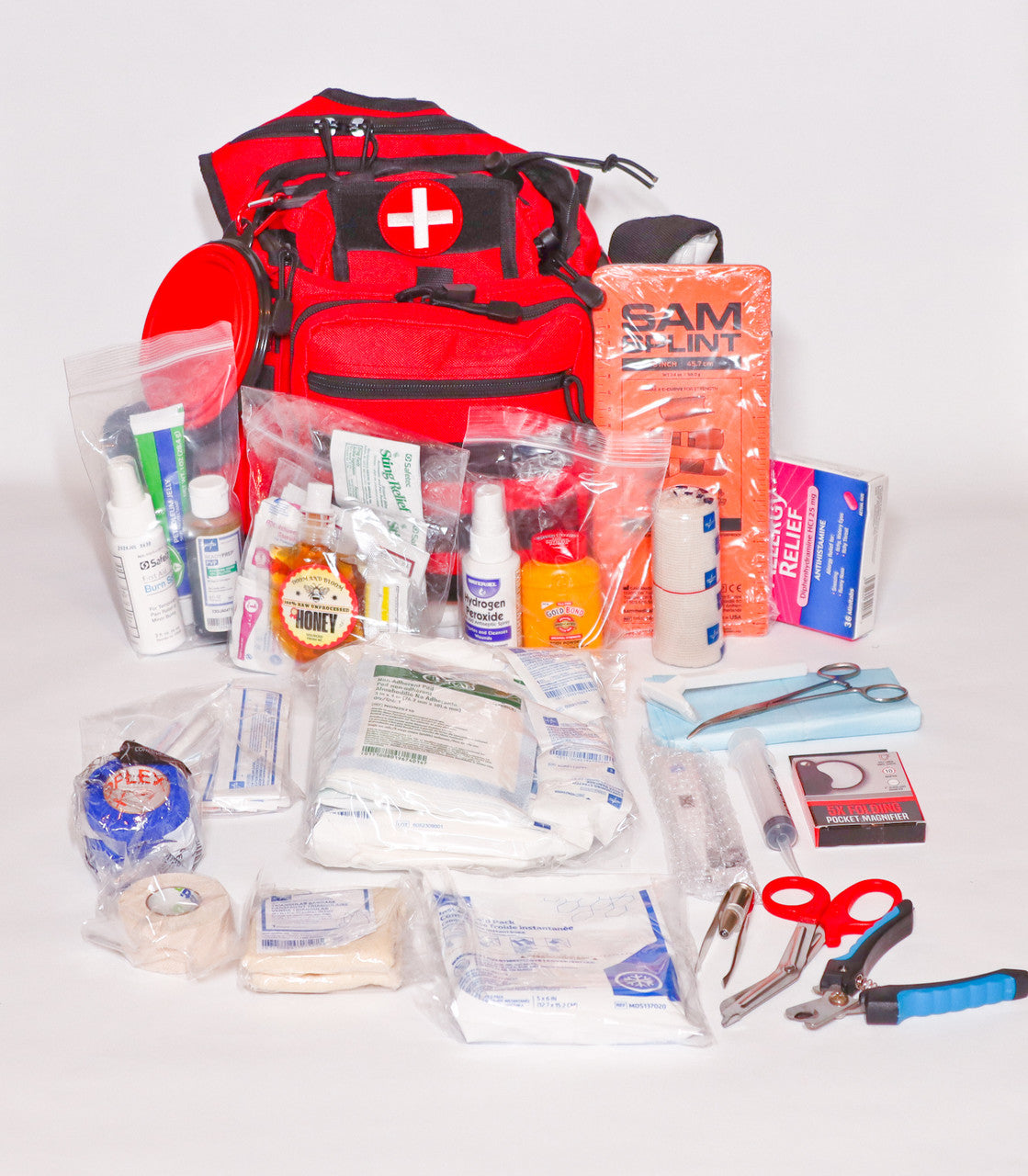 Ultimate Pet and Parent First Aid Kit with partial supplies